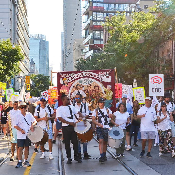 Photo of the labour day parade in action on a sunny day